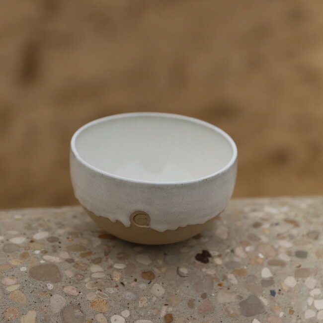 Handmade ceramic bowl with unique glazes from the "White Dunes" service