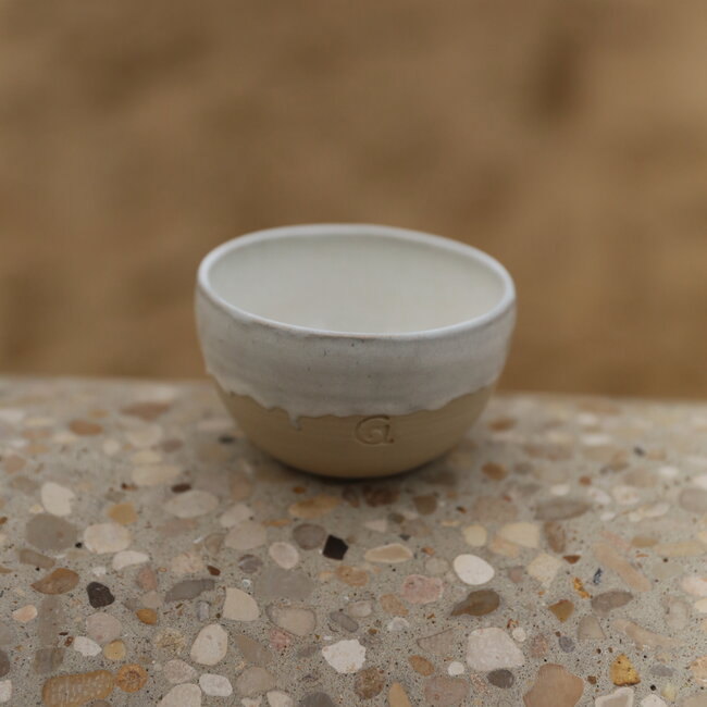 Handmade ceramic bowl with unique glazes from the "White Dunes" service