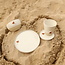 White handmade ceramic tea cup from the “White Heart” service with a sungreen-colored star