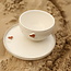 Wit handgemaakt keramisch bord van het servies en de collectie “White Heart" met een sungreen-kleurig hart