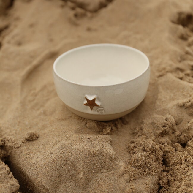 Handmade ceramic bowl with a unique sea star from the coffee tableware "White Star"