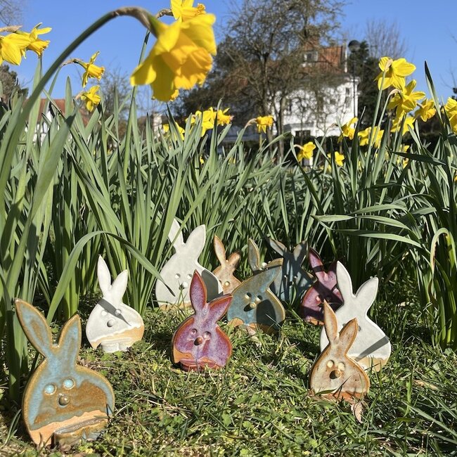 The unique Easter bunny is handmade and finished with our White glaze