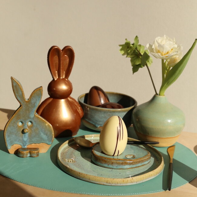 The unique Easter bunny is handmade and finished with our Mint glaze.