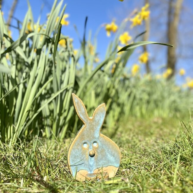 The unique Easter bunny is handmade and finished with our Mint glaze.