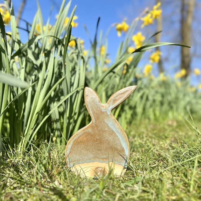 The unique Easter bunny is handmade and finished with our Mint glaze.