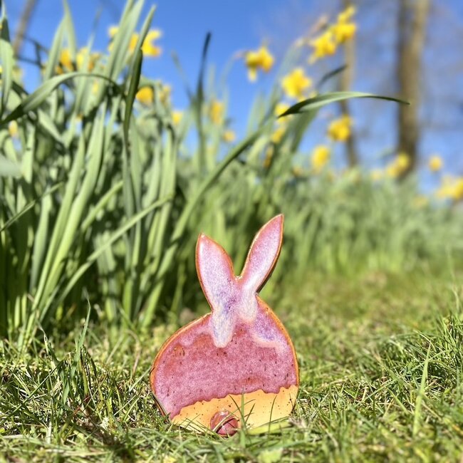 The unique Easter bunny is handmade and finished with our Sunrise glaze