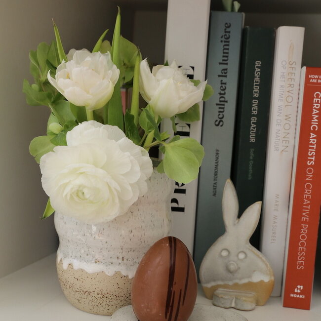 The unique Easter bunny is handmade and finished with our White glaze