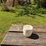 Tasse en porcelaine blanche avec une technique de bulles artistiques « Bulles » comme finition.. Chaque tasse creuse est unique.