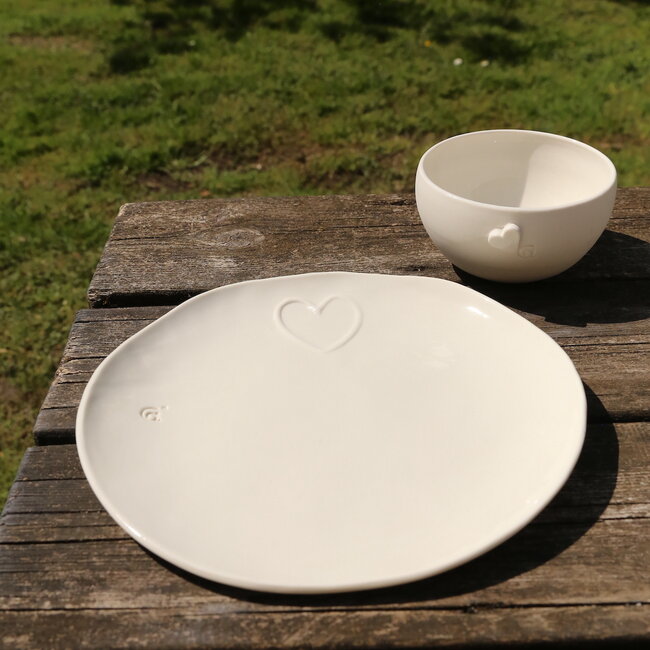 Unique handmade porcelain bowl with a subtle heart incorporated