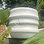 Unique handmade porcelain cup with wavy lines