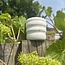 Unique handmade porcelain cup with wavy lines