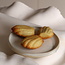 Handmade white ceramic plate from the tableware and collection “White Dunes"
