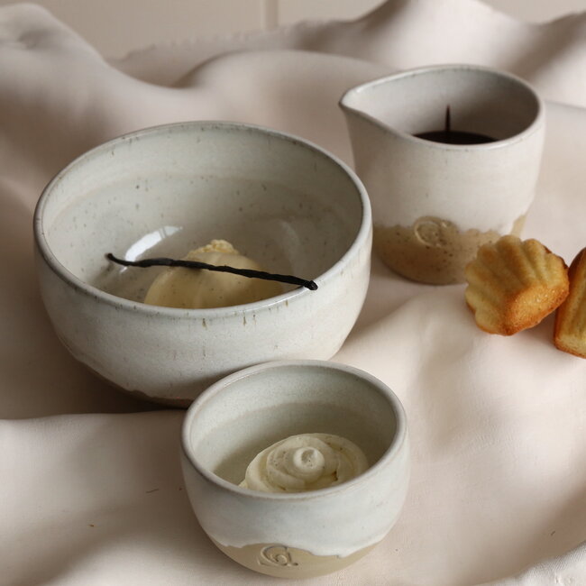 Handmade ceramic bowl with unique glazes from the "White Dunes" service