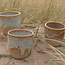 Contemporary, handmade ceramic cup from the tableware and collection “Musterd"