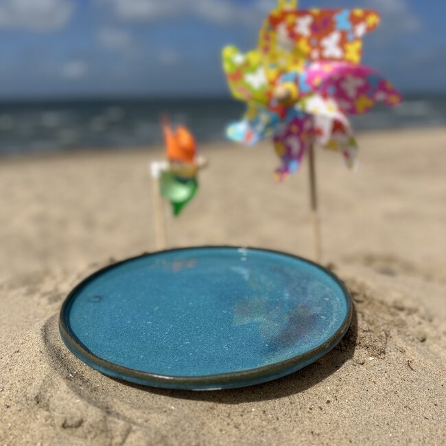 Handmade Turquoise and black ceramic plate from the tableware and collection “Italian Turquoise"