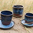 With the turntable handmade plate of Belgien clay with a beautiful Floating blue high-firing glaze.