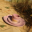 Handmade ceramic plate Amandine in shell shape and glazes pink of the "Chefs Artisann i-lign" for contemporary use as well as for catering.