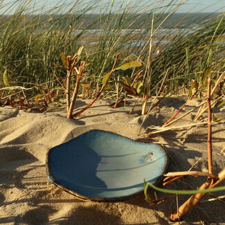 artisanni Schaaltje, ondertas Coquillage Beach