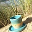 Wavy, handmade ceramic cup “Léonore” for our coffee set "Turquoise"