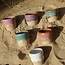 Wavy, handmade ceramic cup “Léonore” for our coffee set "Turquoise"