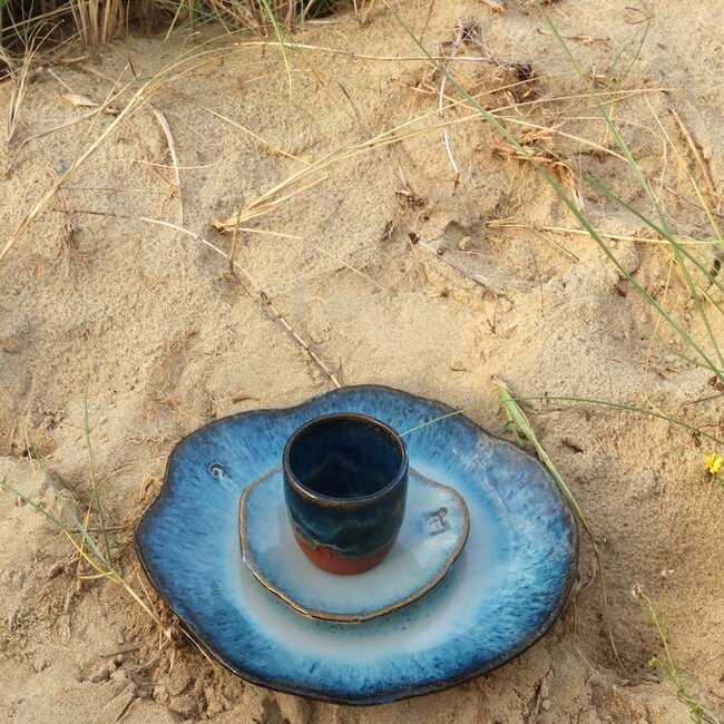 Unique handmade ceramic shell-shaped plate for tapas, snacks, bowl for coffee