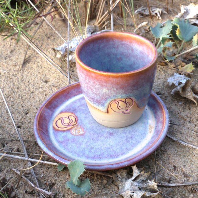 Handmade ceramic plate with stamp