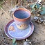 Handmade ceramic cup with stamp