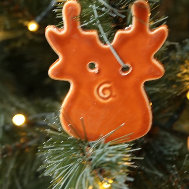 Handmade porcelain deer finished with a brown glaze