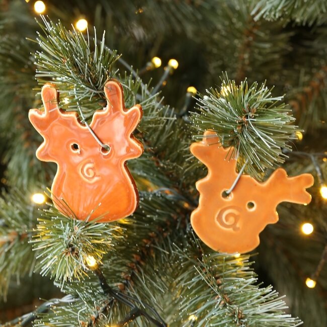 Handmade porcelain deer finished with a brown glaze