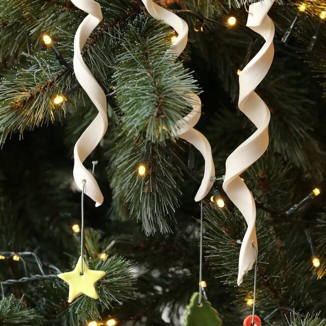 Handmade porcelain icicle finished with a Christmas item