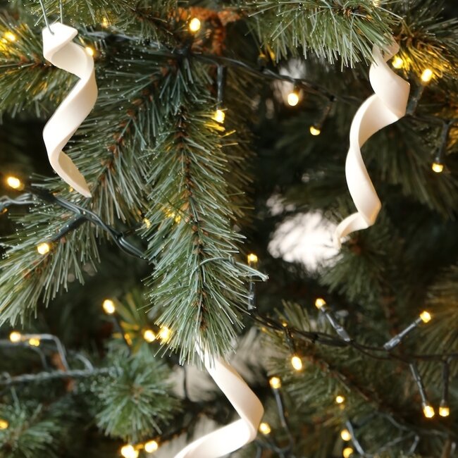 Handmade porcelain icicle finished with a Christmas item