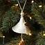 Handmade porcelain Christmas bell decorated with a Christmas figurine