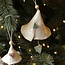 Handmade porcelain Christmas bell decorated with a Christmas figurine