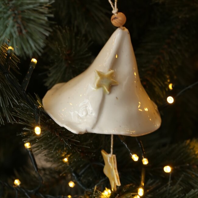 Handmade porcelain Christmas bell decorated with a star