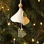 Handmade porcelain Christmas bell decorated with a Christmas tree
