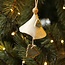 Handmade porcelain Christmas bell decorated with a Christmas tree