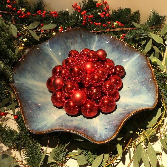 Handmade scale  with a beautiful Floating blue high-firing glaze.