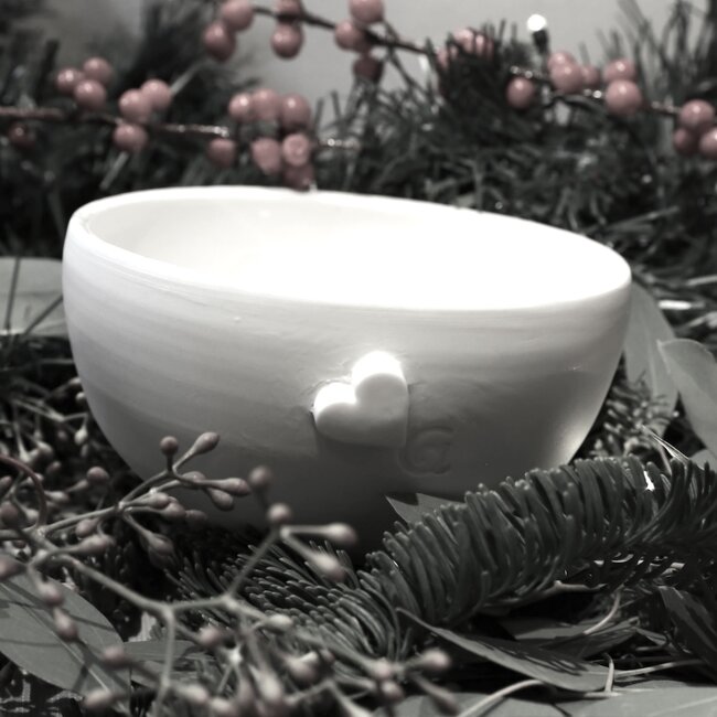 Unique handmade porcelain bowl with a subtle heart incorporated