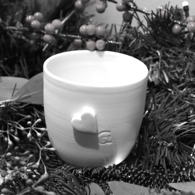 Unique handmade porcelain cup with a subtle heart incorporated