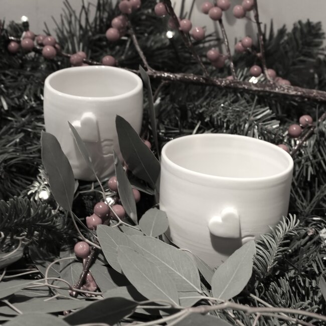 Unique handmade porcelain cup with a subtle heart incorporated