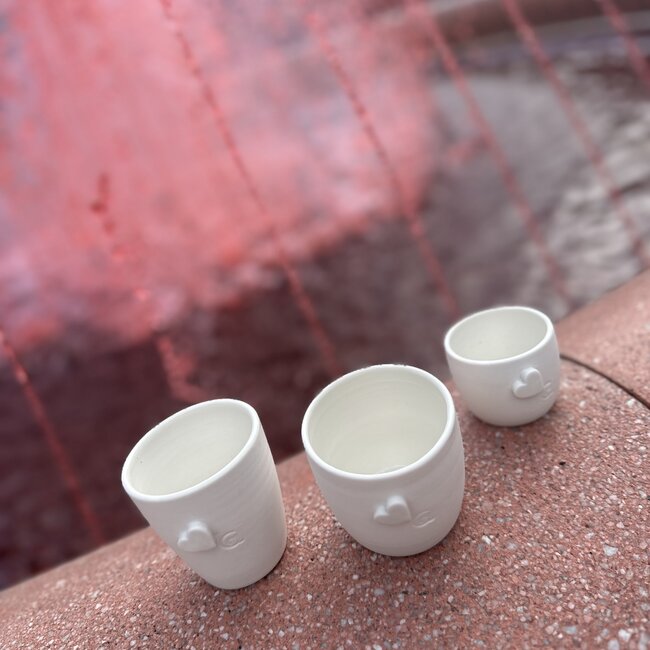 Unique handmade porcelain cup with a subtle heart incorporated
