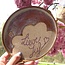 Personalize a ceramic plate with a handwritten name