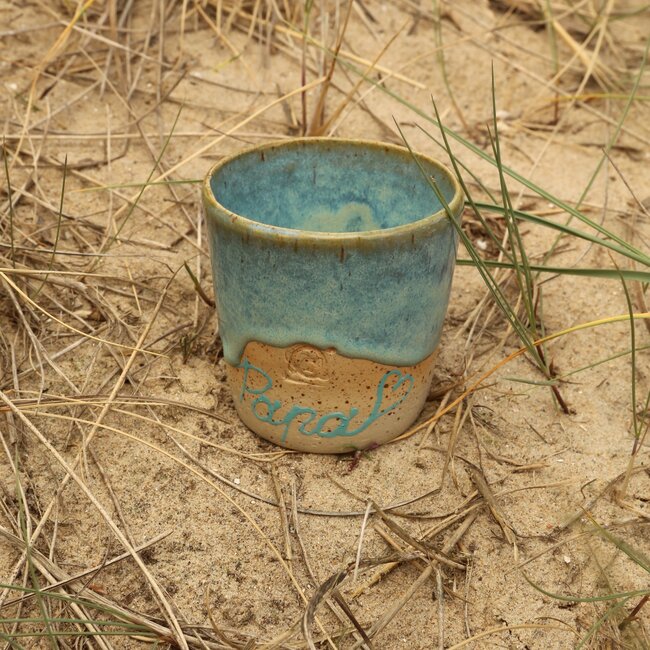 Personalize a ceramic coffee mug with a handwritten name