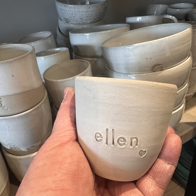 Handmade ceramic cup with name stamped on it