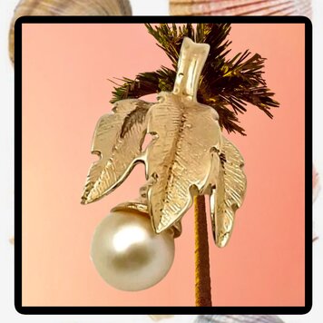 Palmleaf pearl charm