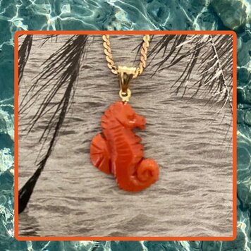 Coral seahorse charm 18crt setting