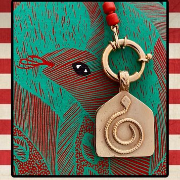 Snake amulet wearable on 2 sides 14 crt