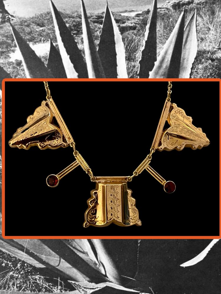 Pyramid shaped dangling ruby necklace 14 crt