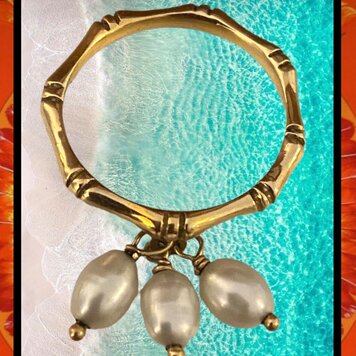 Bamboo dangle pearl ring 14 crt