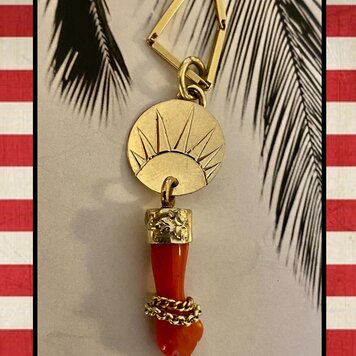 Sunburst dangle Figa charm coral 14 crt gold